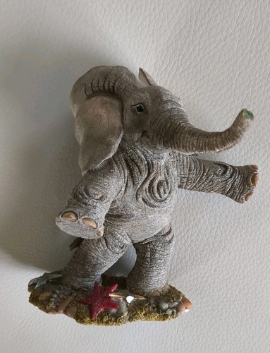 Tuskers elephant catch a - catch,