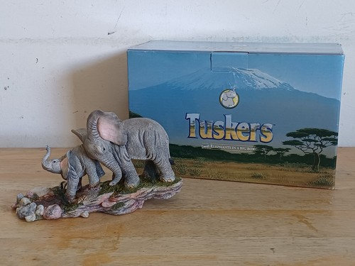 Tuskers mud bath - 'mud, baby'