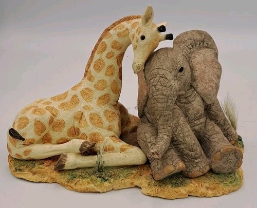 Tuskers elephant and giraffe - and, '